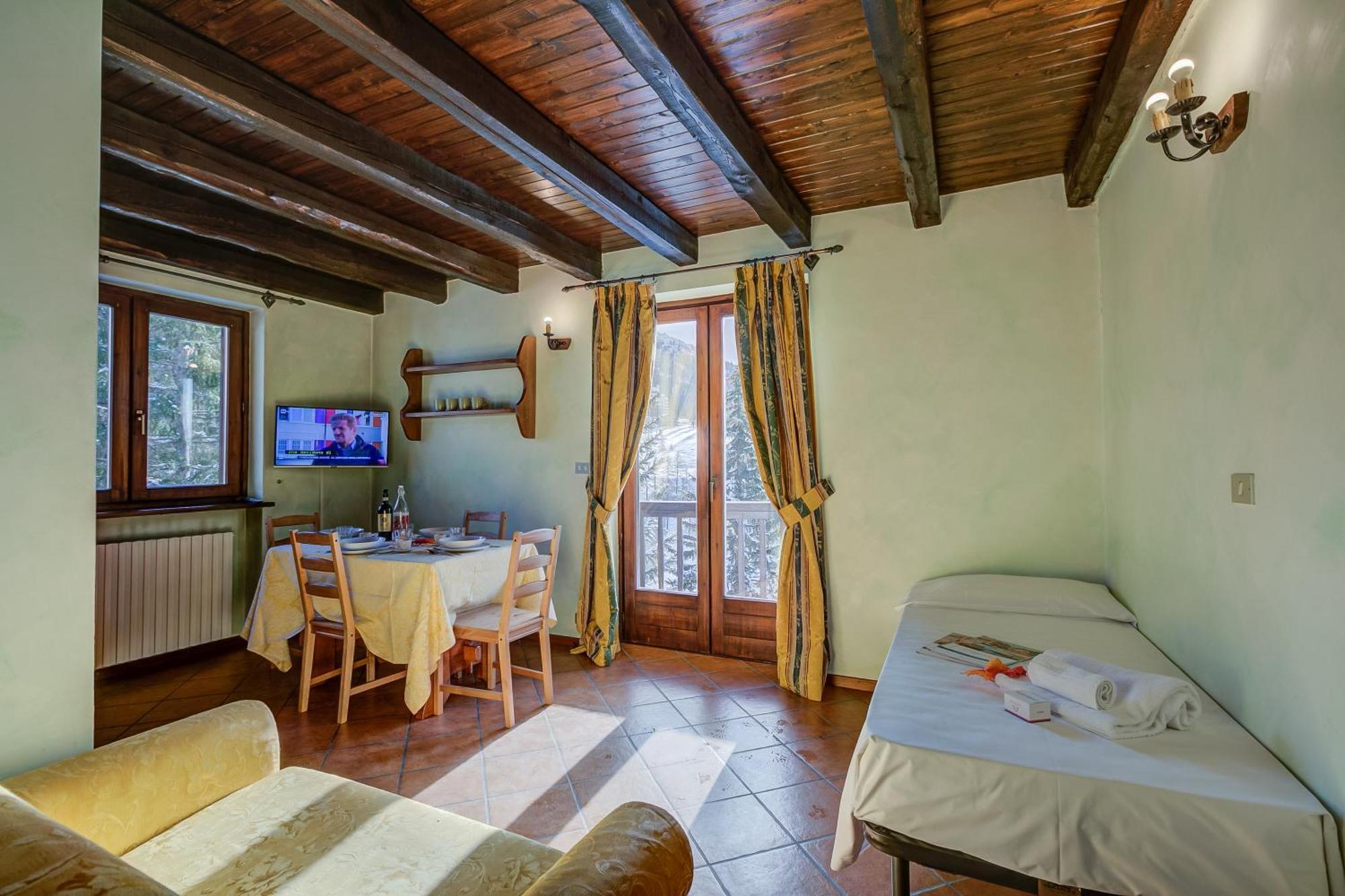 Belvedere Apartments - Happy Rentals Sestriere Luaran gambar